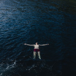 An inmate is enjoying a bath in of Porto Paone cove. Nisida, July 2021.

Nisida is the only juvenile hall in Italy where inmates can swim in the sea. Thanks to a special permit from the magistrate, with the beginning of summer, the boys can leave the main building of the penitentiary and go to the cove of Porto Paone, a small bay on the island, off-limits to the public.